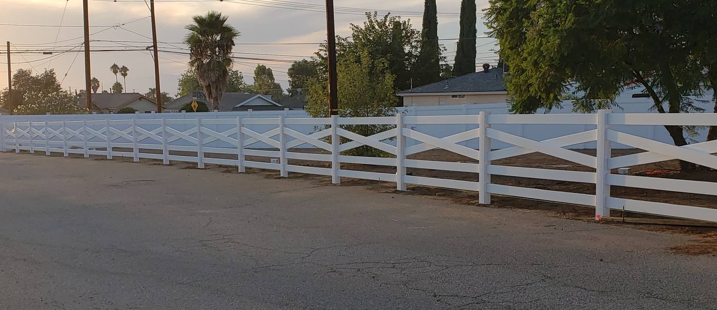 Custom farm style fencing built along a property line