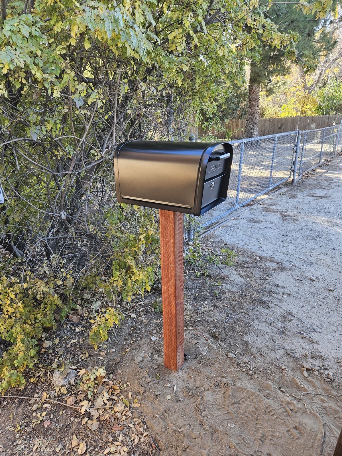 New mailbox post installed at the curb