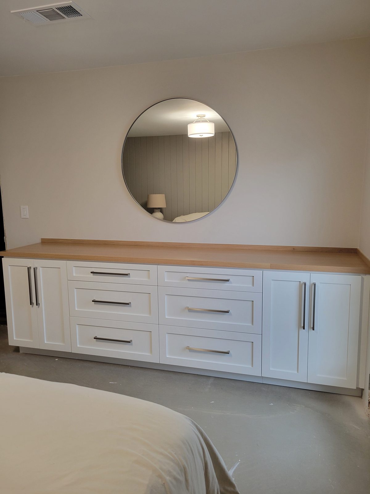 Custom cabinets with a tongue and groove accent wall