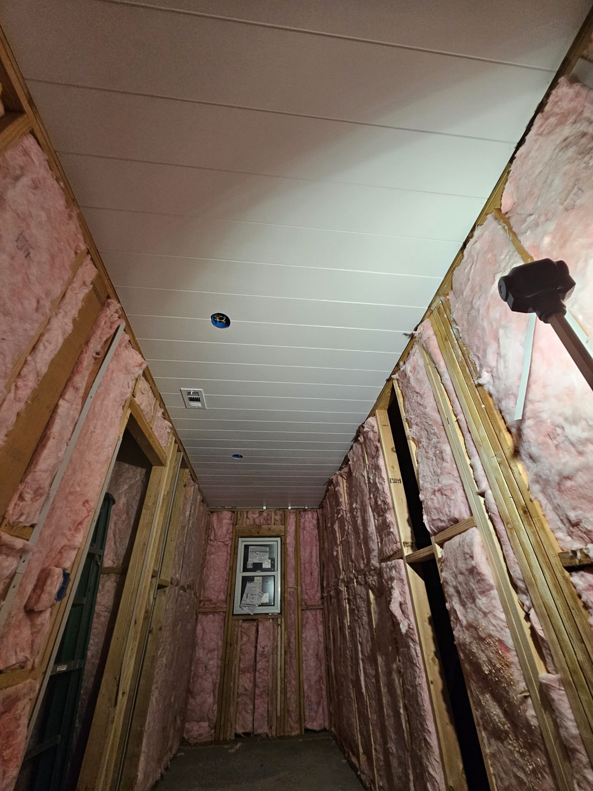 Custom closet ceiling framed and paneled in progress