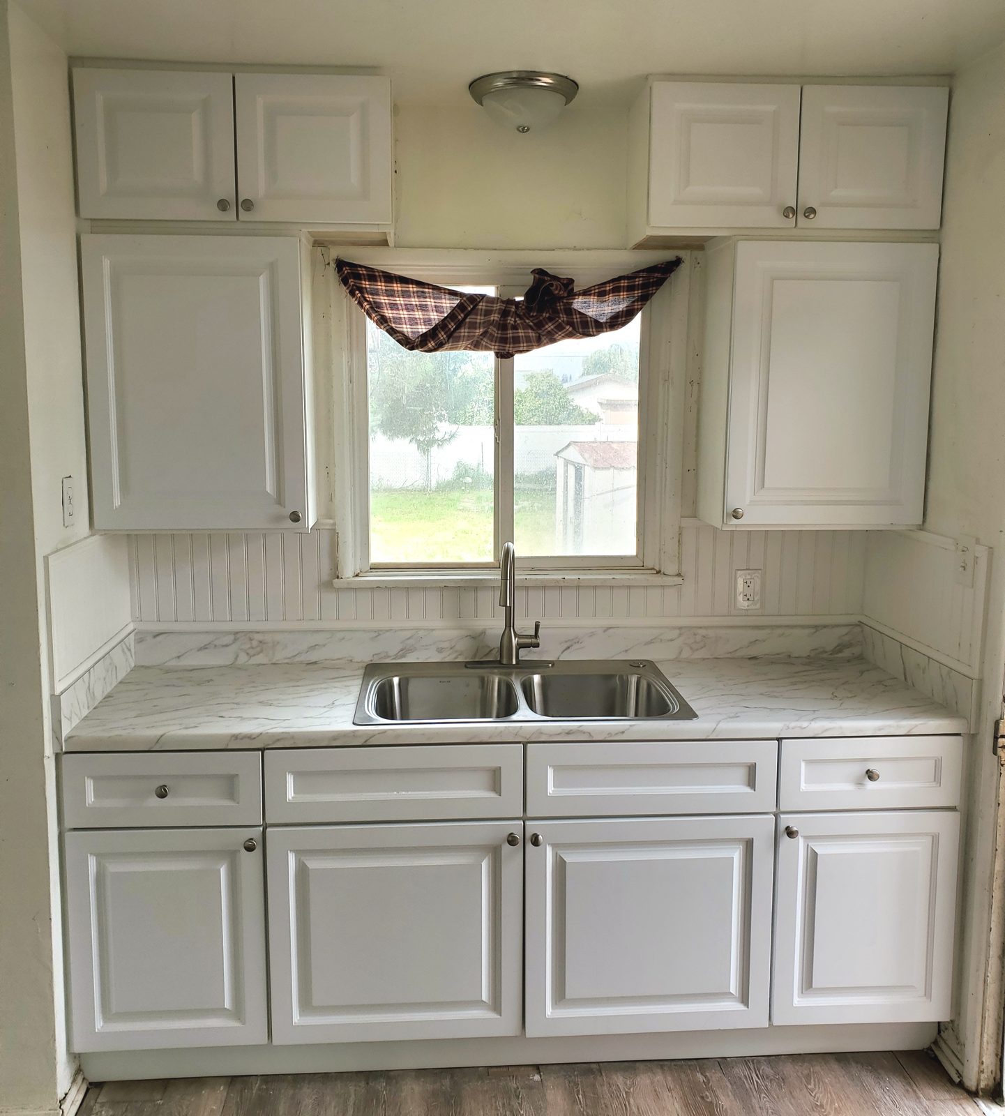 Custom wet bar built with cabinets and counter