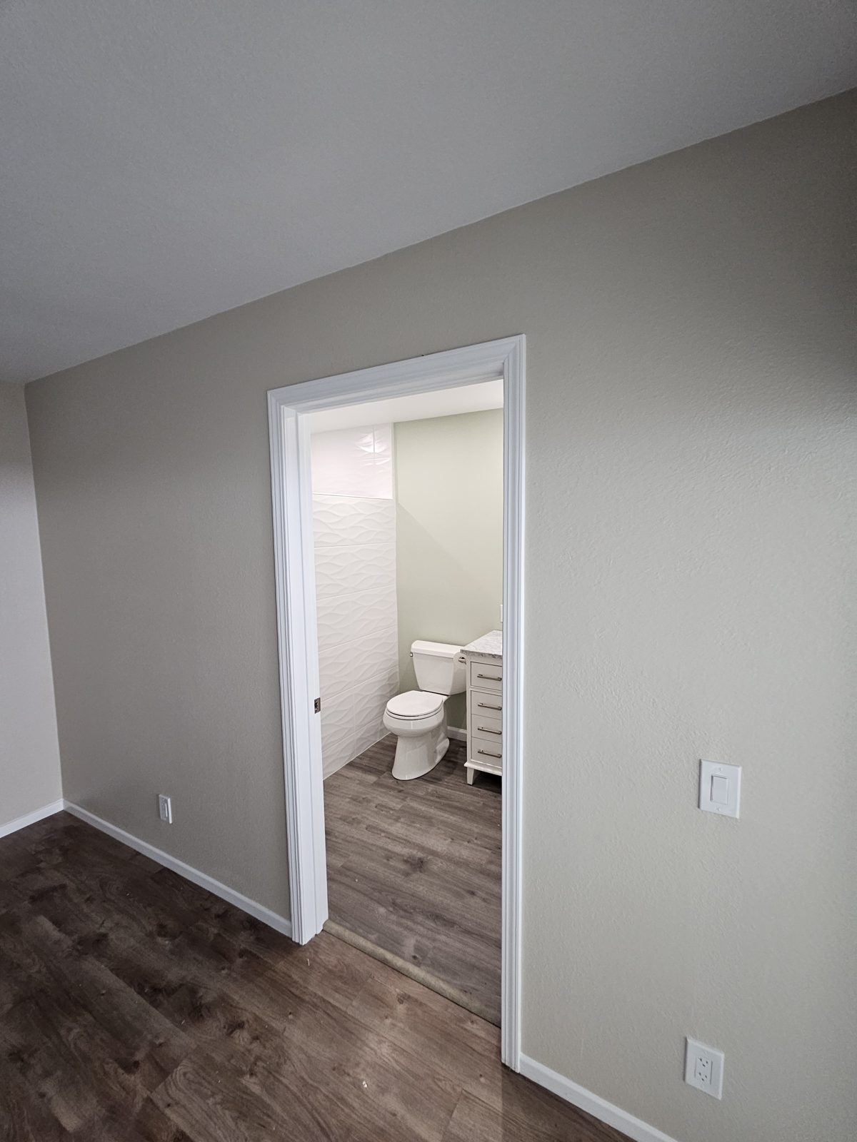 Custom partition wall built in a bathroom remodel