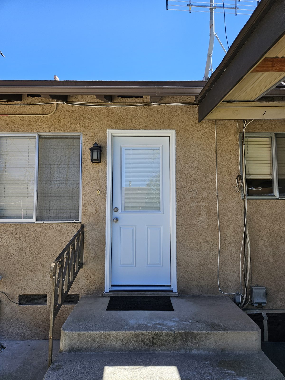 Exterior door with internal blinds installed