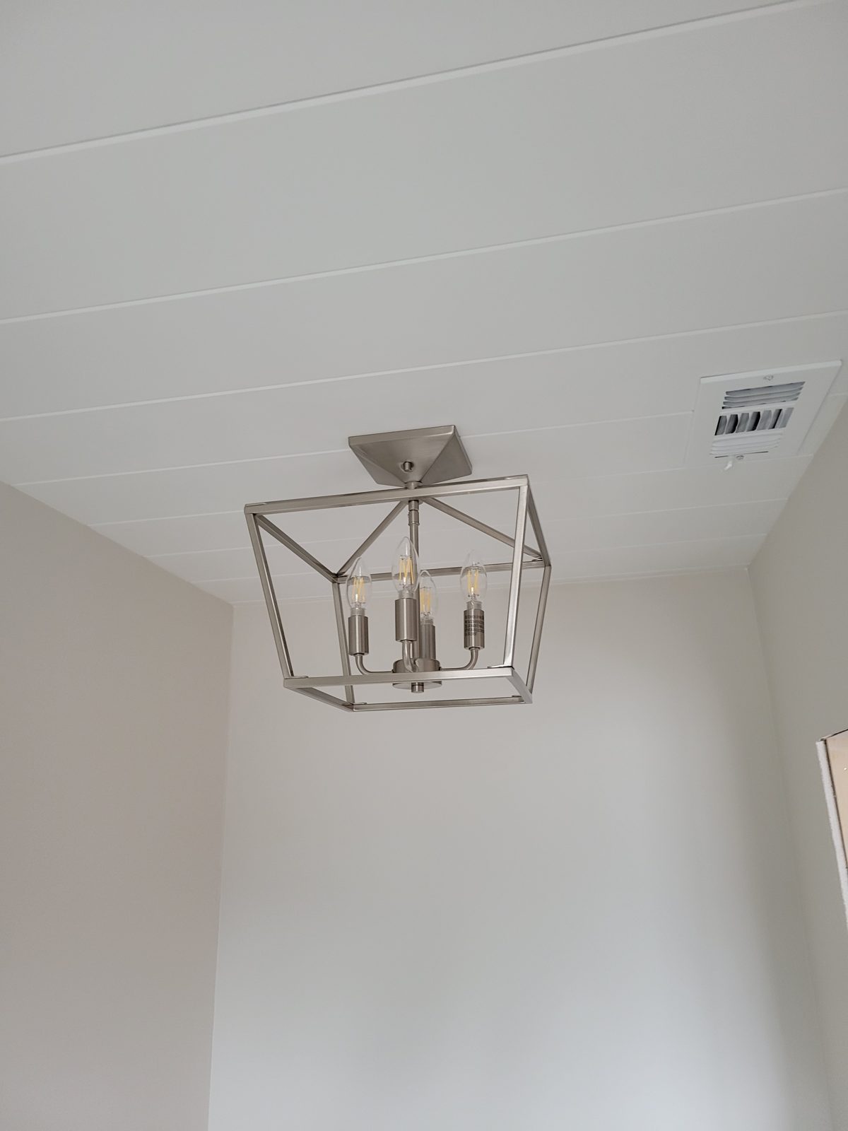 Custom wood plank ceiling detail