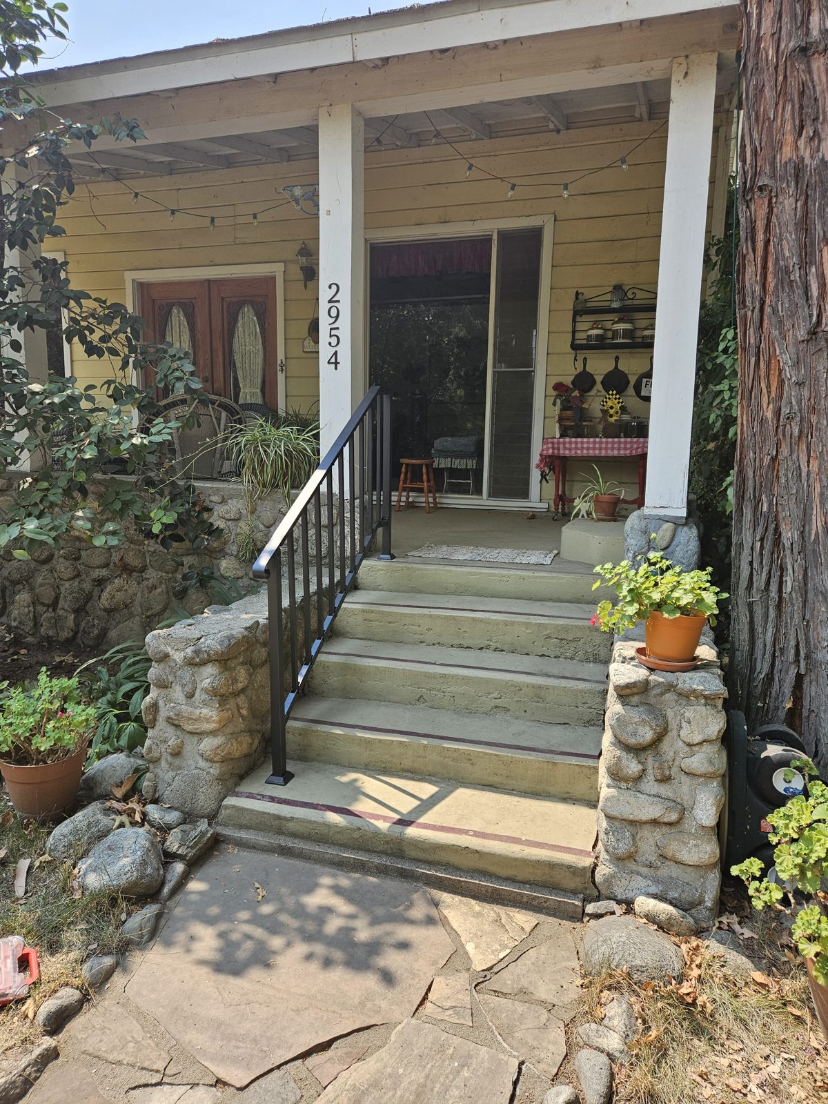 Custom handrail installed along steps