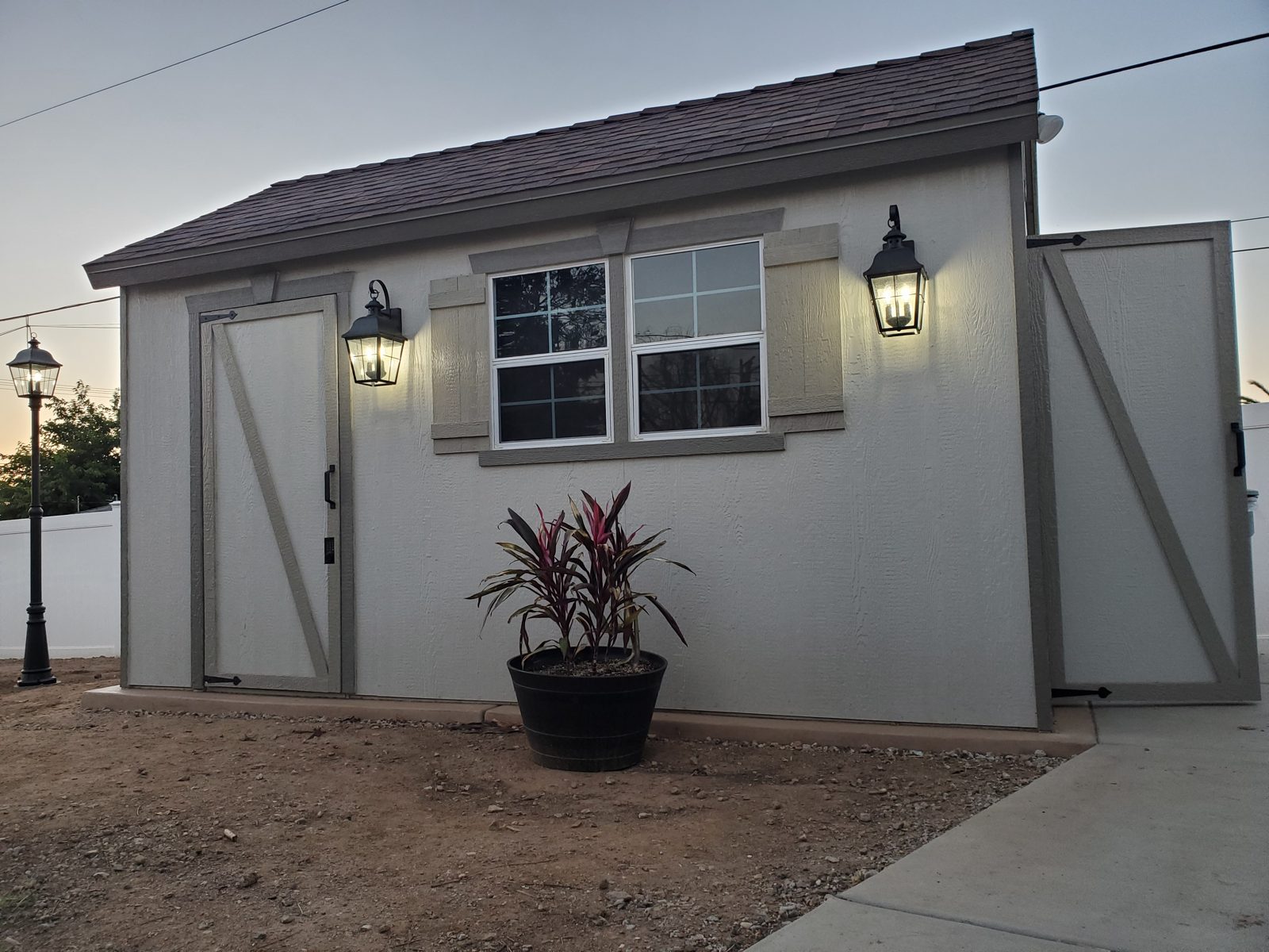 Backyard shed built and wired with lights