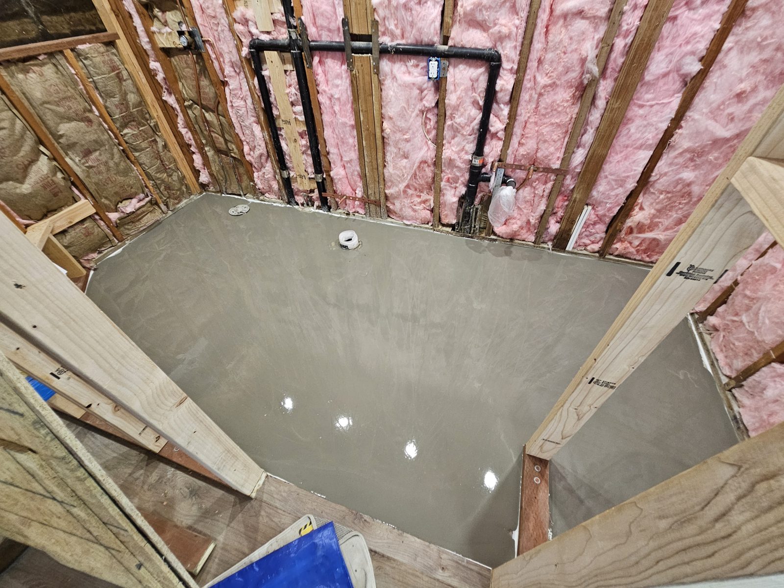 Self leveling compound poured to flatten a floor
