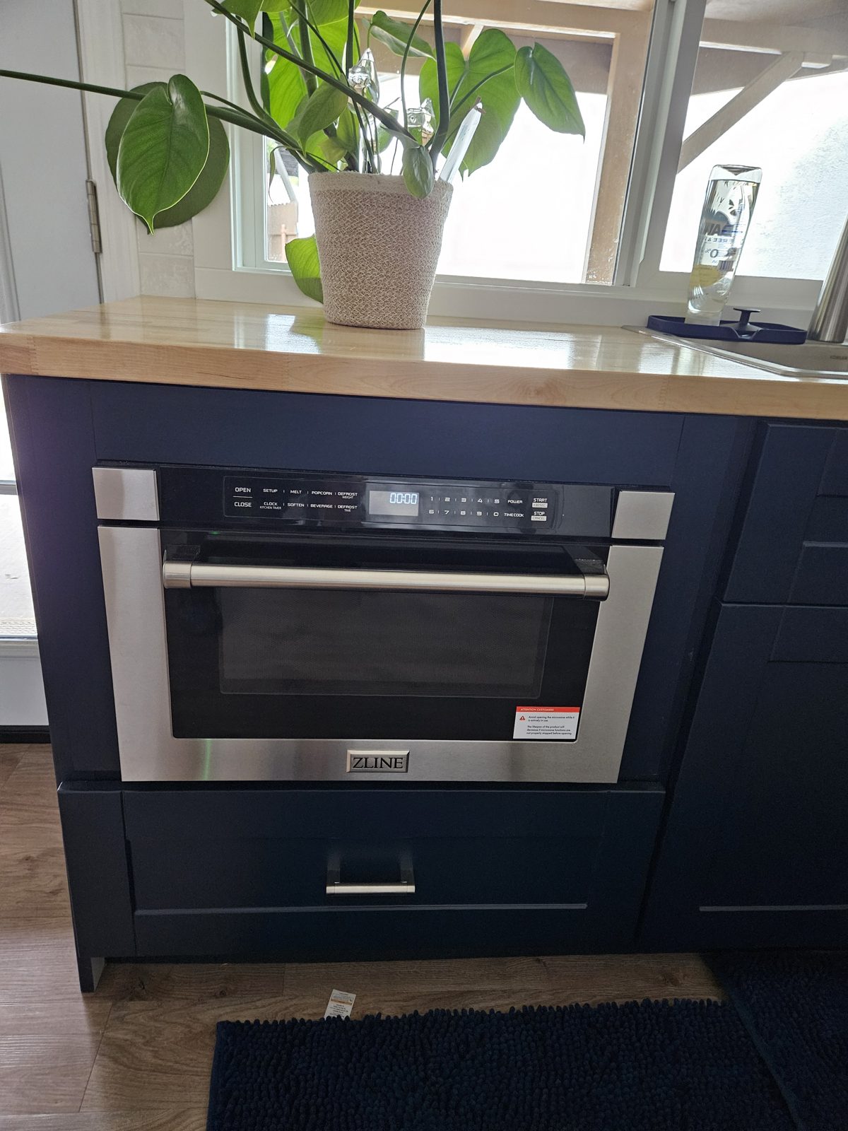 Built-in drawer microwave installed in a kitchen cabinet