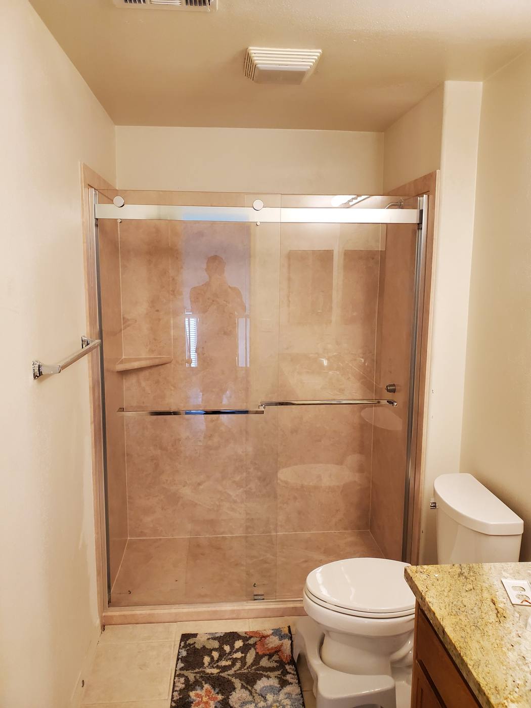 Frameless glass shower door installed