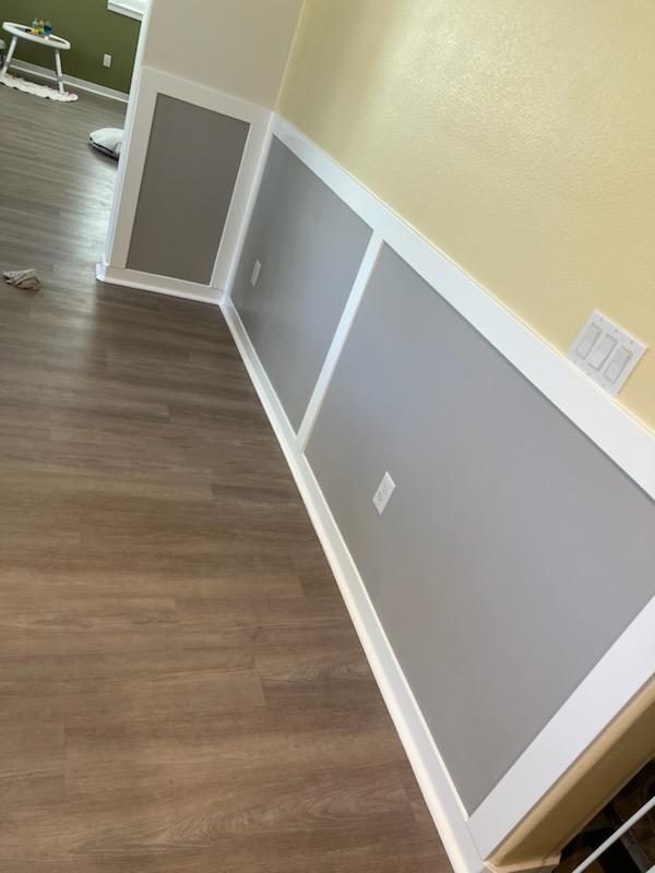 Custom wood wall paneling installed in a living space