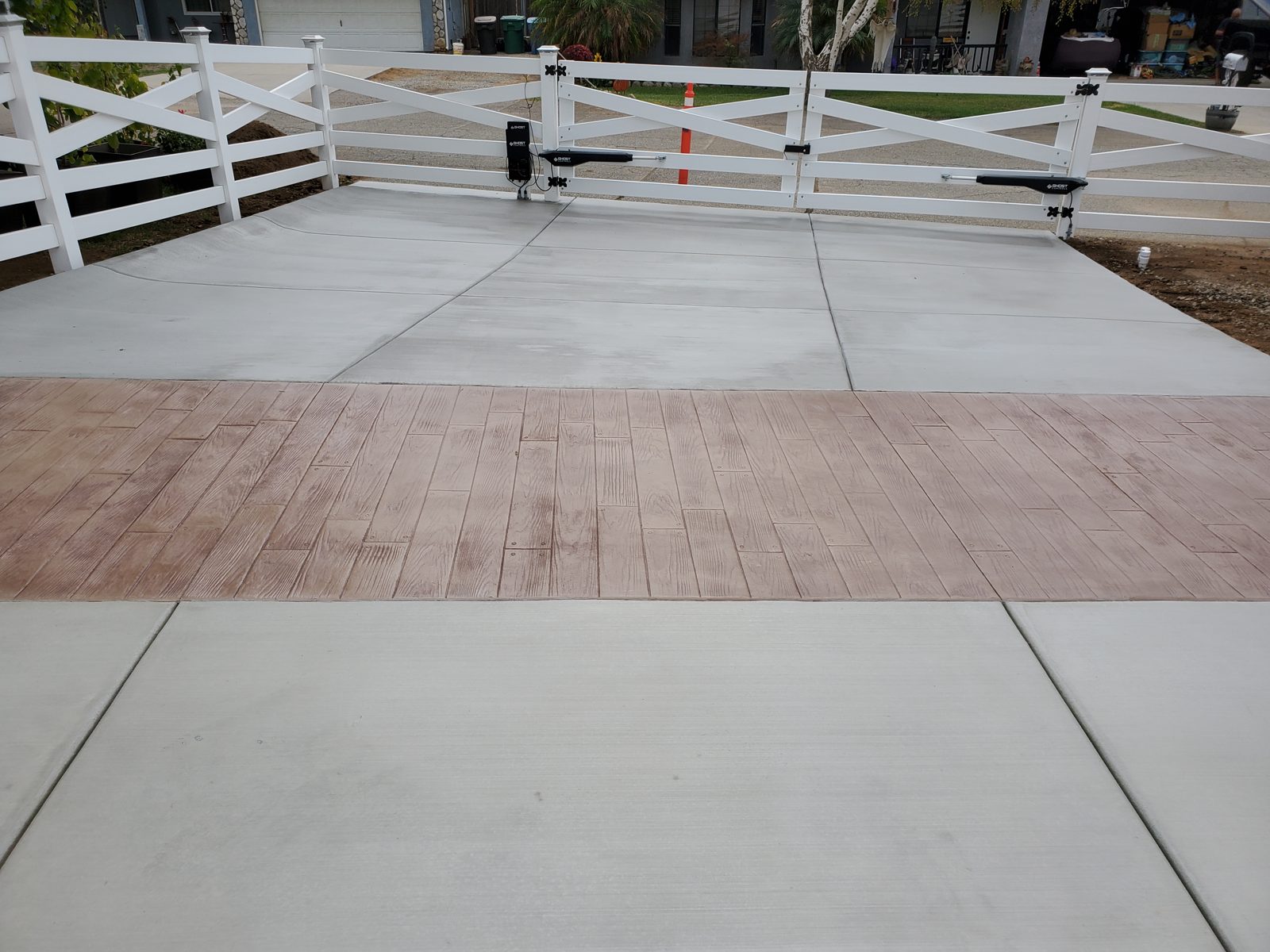 Driveway with decorative stamped concrete border