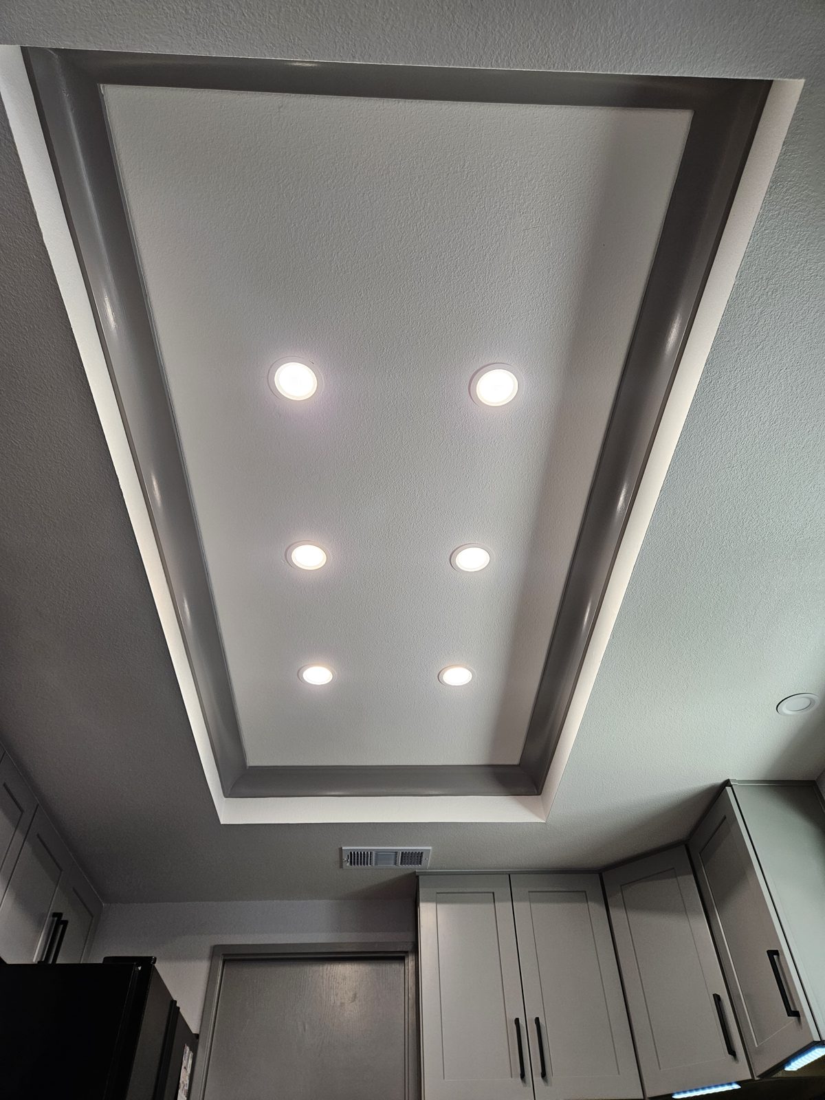 Recessed LED lights installed in a ceiling