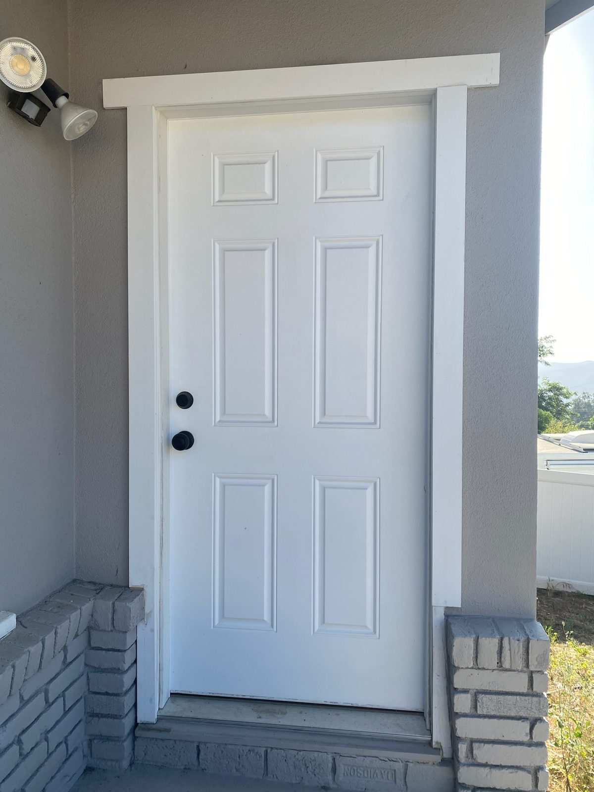 Interior door with custom casing and trim