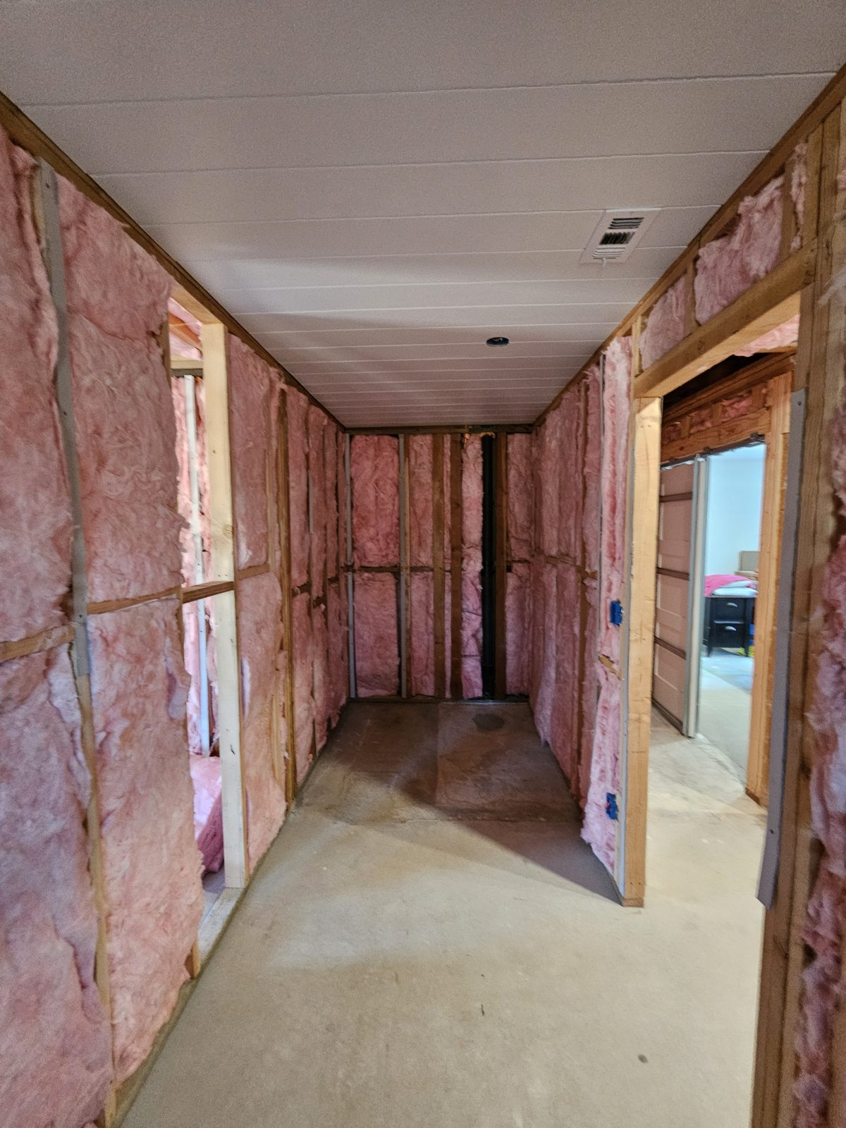 Tongue and groove ceiling and insulation in a custom closet