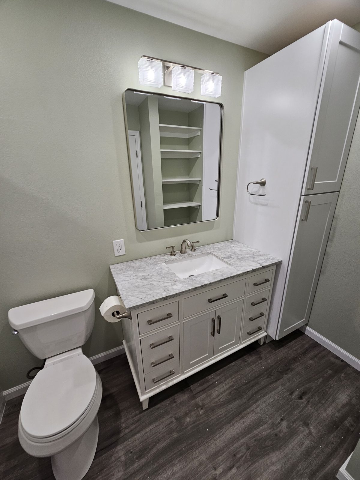 Full bathroom remodel with new vanity, tile and fixtures