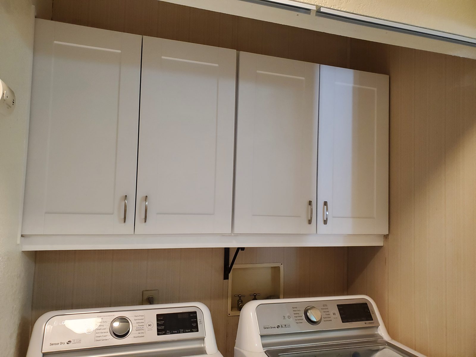 Upper kitchen cabinets installed and leveled