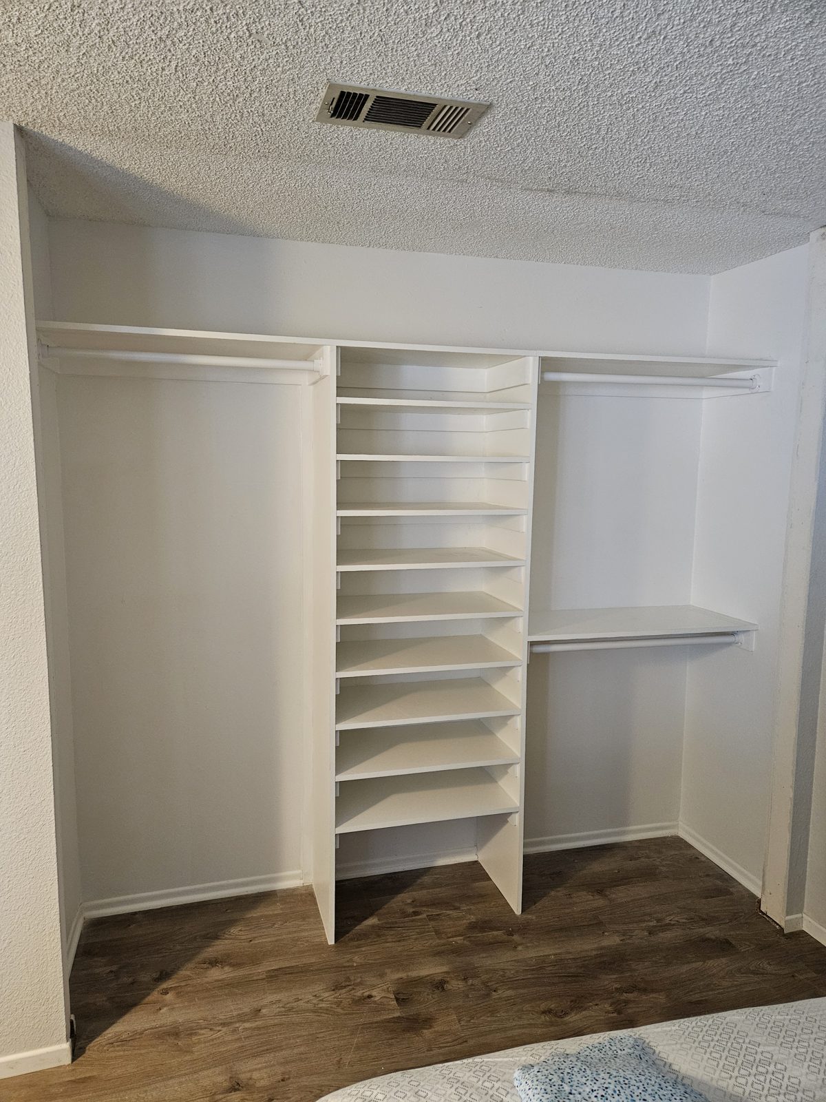 Customized closet with built-in shelving and hanging space