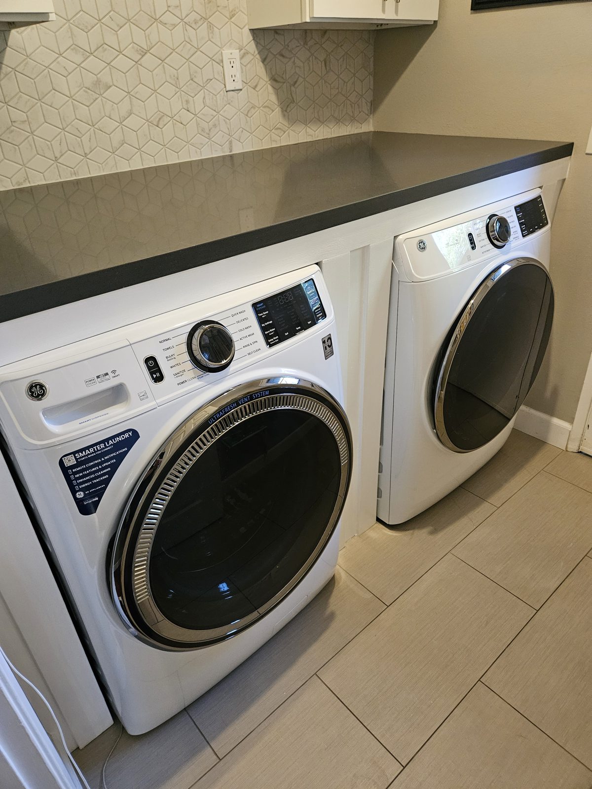 Custom enclosure built around a washer and dryer